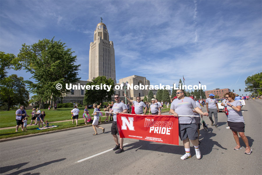 The Husker Pride group walks the parade route around the Nebraska State Capitol on June 19. Thousands attended the inaugural parade. More than 20 members of the university community marched together during Lincoln's first Star City Pride parade. A number of campus administrators, including Chancellor Ronnie Green and his wife, Jane, participated in the walk around the Nebraska State Capitol. Star City Pride parade on June 19, 2021. Photo by Troy Fedderson / University Communication.